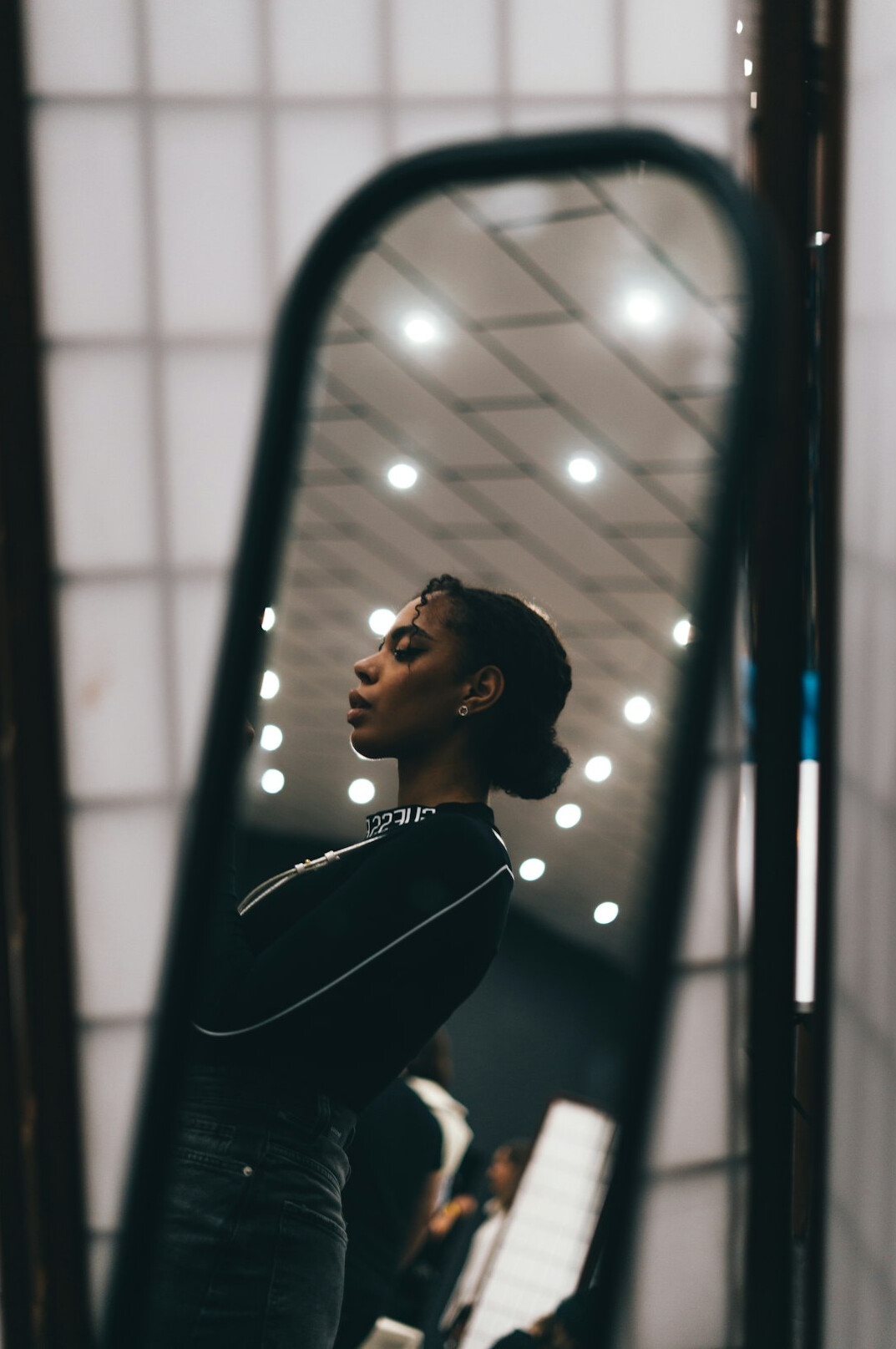 woman practicing speech in mirror