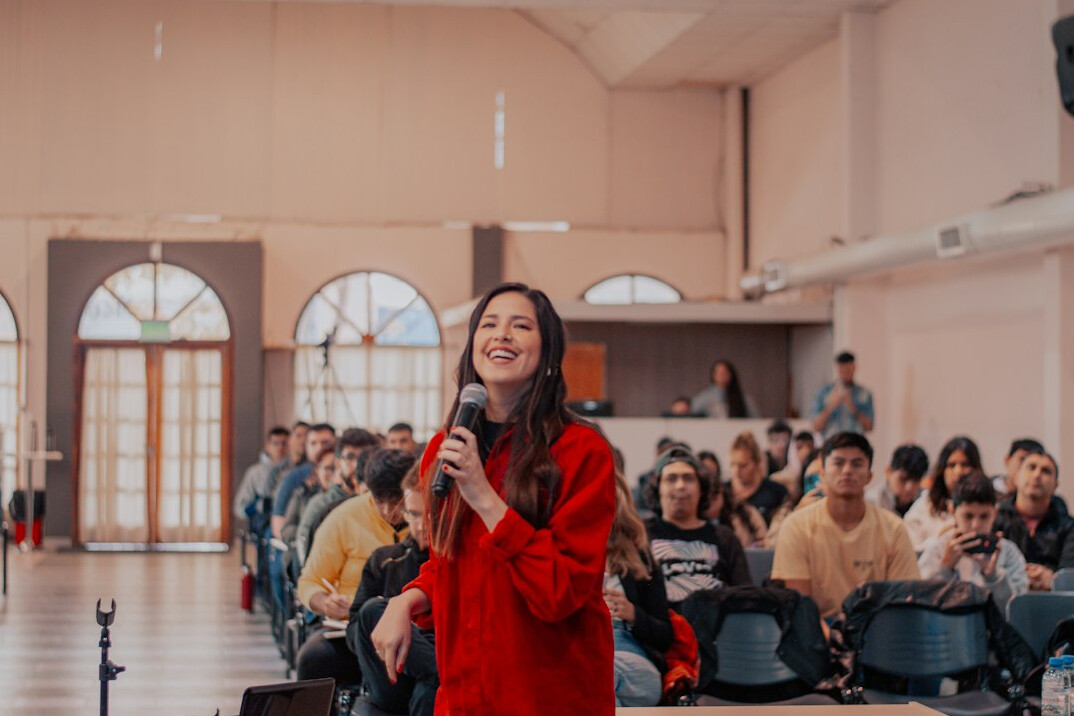 confident speaker on stage