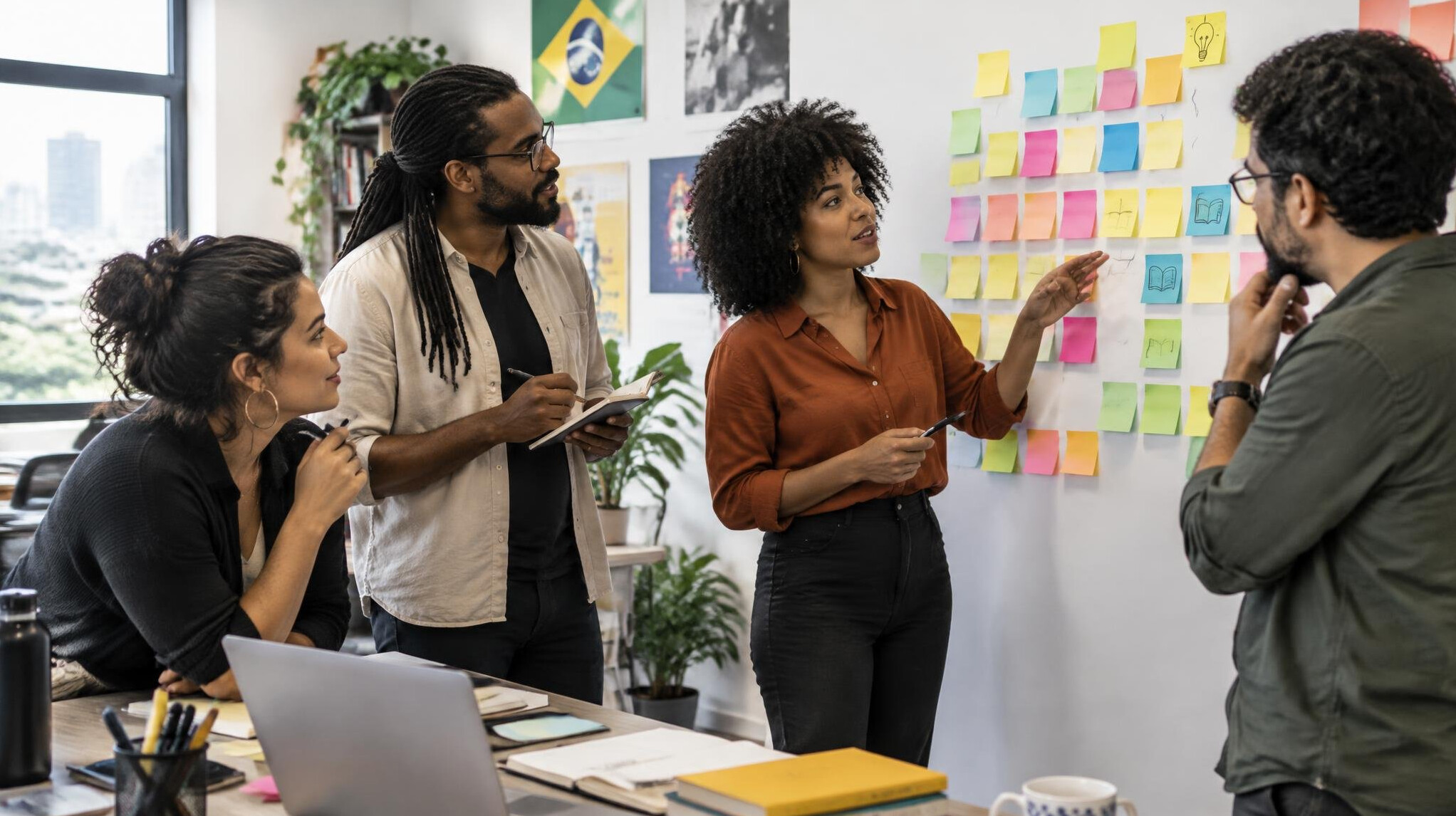Team brainstorming with sticky notes on a wall