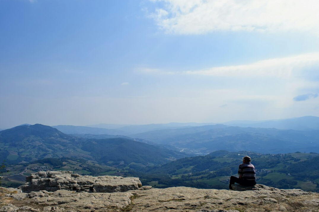 person meditating in nature