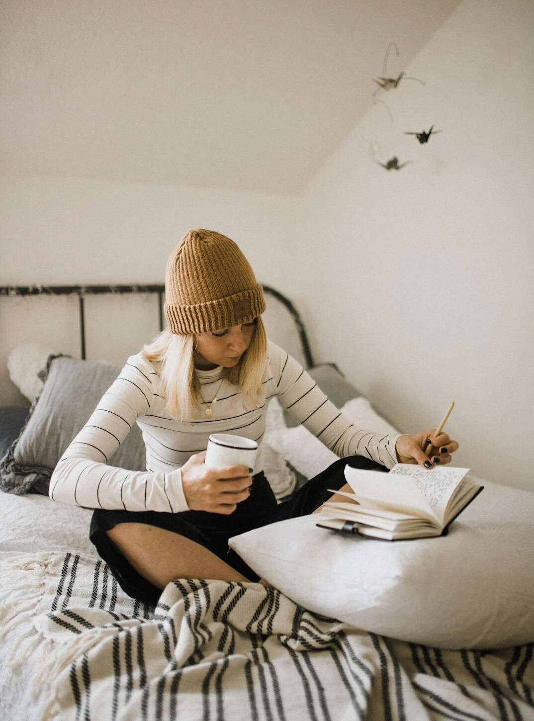 woman writing in journal